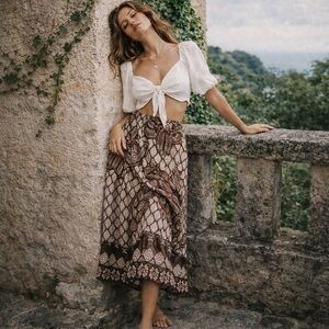 Scandal Italy brown printed midi slip skirt